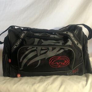 NWOT Ecko Unlimited Black Duffel Bag With Graphics    (19 1/2” X 9 1/2” X 11”)